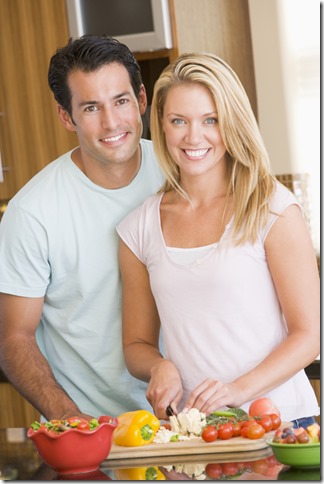 Husband And Wife Preparing meal,mealtime Together